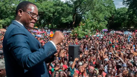 Getty Images Malawi Congress Party (MCP) President Lazarus Chakwera adresses supporters during celebrations, outside the MCP Headquarters in Lilongwe February 4, 2020