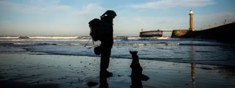 Stewart and Cariad on the beach in Whitby