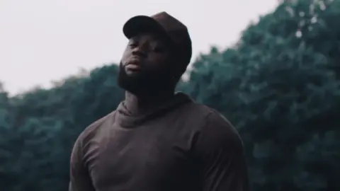 Cadet/YouTube A still from Cadet's letter