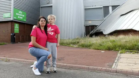 LDRS Hannah Taylor and daughter outside Walker activity dome
