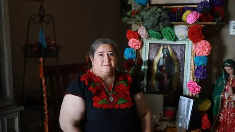Alejandra Sol Casas Hilda Robles poses at her home in San Antonio