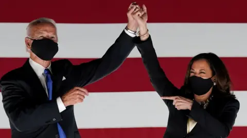 Reuters Democratic presidential candidate and former Vice President Joe Biden and U.S. Senator and Democratic candidate for Vice President Kamala Harris celebrate outside the Chase Center after Biden accepted the 2020 Democratic presidential nomination during the largely virtual 2020 Democratic National Convention, in Wilmington, Delaware, U.S., August 20, 2020