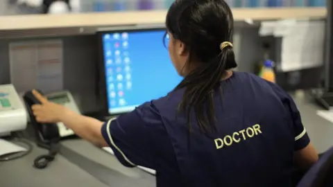 Getty Images doctor on phone