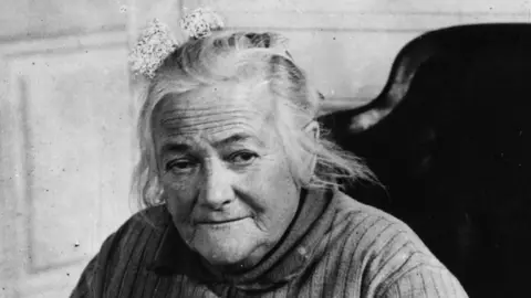 Corbis / Hulton Deutsch Clara Zetkin looks to the camera