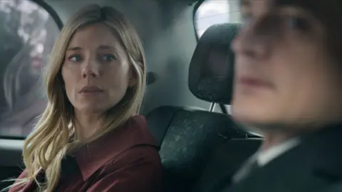 Netflix Sienna Miller performing her role as Sophie Whitehouse