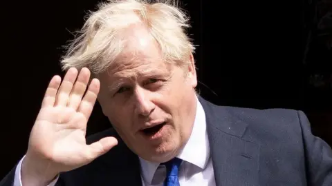 Getty Images Boris Johnson outside 10 Downing Street