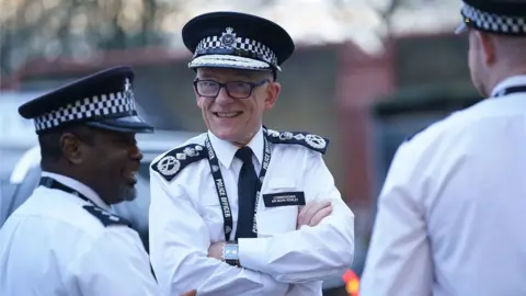 PA Media File photo of Sir Mark Rowley speaking to Mother members of the Met police