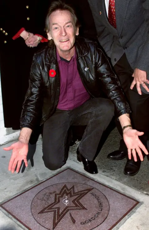 Reuters Gordon Lightfoot shows off his star on the Walk of Fame in Toronto in November 1998