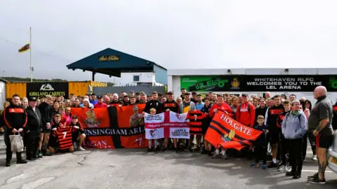 Ben Challis Sports Photography The assembled walkers at Whitehaven's ground at the completion of the walk
