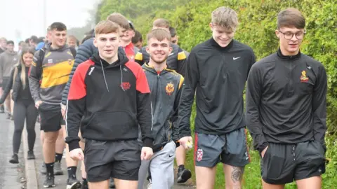 Ben Challis Sports Photography Dozens of walkers make their way along the route
