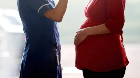 PA Media Midwife and pregnant woman
