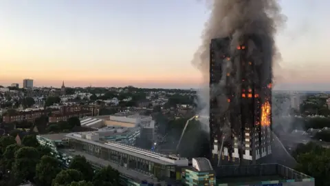 AFP/Getty Images Grenfell Tower on fire