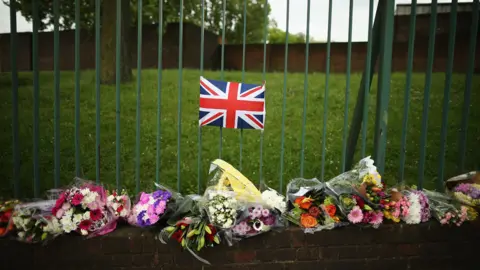 Getty Images Flowers lay close to the scene where Drummer Lee Rigby of the 2nd Battalion the Royal Regiment of Fusiliers was killed, on May 24, 2013 in London, England.