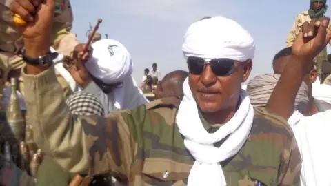 AFP Musa Hilal saluting followers upon his arrival in Nyala, capital of South Darfur state. 7 Dec 2013
