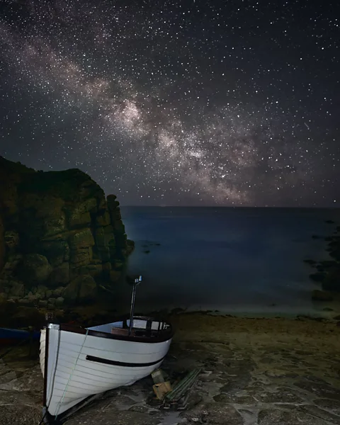 Chris Colyer A starry night sky at Porthgwara Beach in Cornwall (Credit: Chris Colyer)