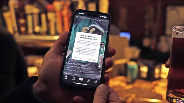 An iPhone with TikTok installed, ,000