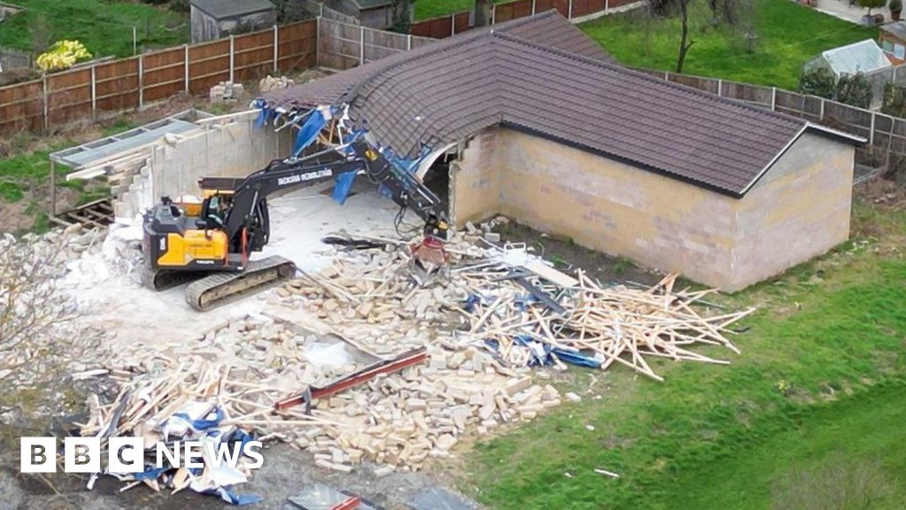 Unauthorised spa building demolition begins Unauthorised spa building demolition begins