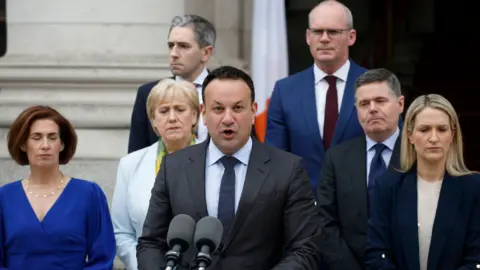 PA Media Leo Varadkar and party members speaking to media