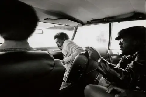 Stephen Shames Photographic Archive Bobby Seale, in front passenger seat, with other Black Panthers