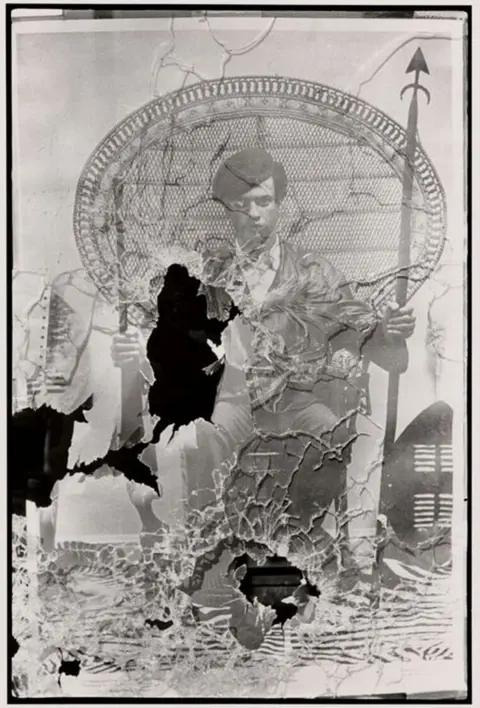 Stephen Shames Photographic Archive A Black Panther Party office window in Oakland shattered by bullets