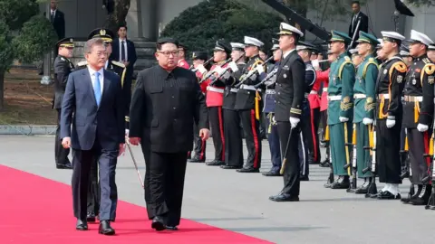 Getty Images North Korean leader Kim Jong Un (L) and South Korean President Moon Jae-in (R) walk to the official welcome hall after meeting and Kim crossing the military demarcation line (MDL) for the Inter-Korean Summit on April 27, 2018 in Panmunjom, South Korea
