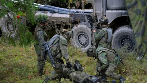 Getty Images Finnish troops along with other Western forces took part in Sweden's biggest military exercise for years in 2017