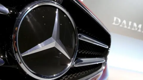 Reuters Mercedes-Benz badge