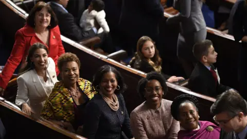 Getty Images Representatives Alexandria Ocasio-Cortez(2ndL), a Democrat from New York, from left, Barbara Lee, a Democrat from California, Jahana Hayes, a Democrat from Connecticut, Lauren Underwood, a Democrat from Illinois, and Sheila Jackson-Lee, a Democrat from Texas