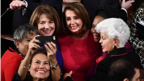 Getty Images Nancy Pelosi (C), D-CA, is photographed with fellow Congresswomen