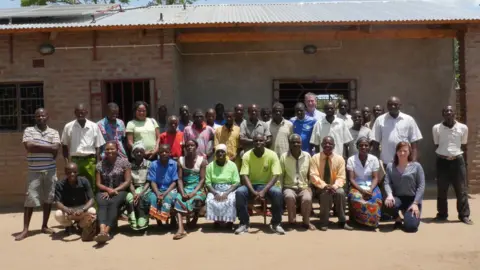 Strathclyde University Research team and locals in Malawi