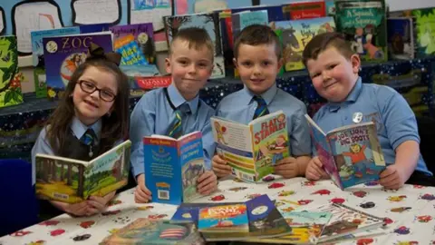 Renfrewshire Council Pupils from St Anthony's Primary in Johnstone - Olivia Regan, Jack McLaughlin, David Baird and Corey Jamieson, which was named Literacy School of the Year by the UKLA in March 2018.