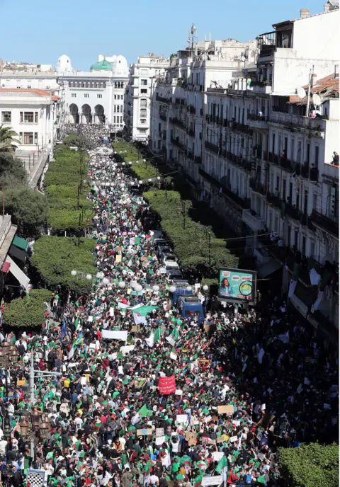 EPA Algerians protesting against President Abdelaziz Bouteflika pictured in the capital, Algiers, on 15 March 2019.