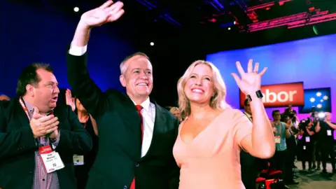 Getty Images Bill and Chloe Shorten wave to crowds