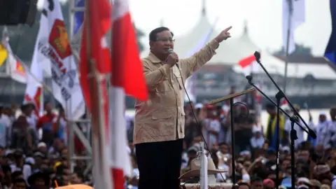 Anadolu Agency/Getty Images Prabowo Subianto addresses a rally