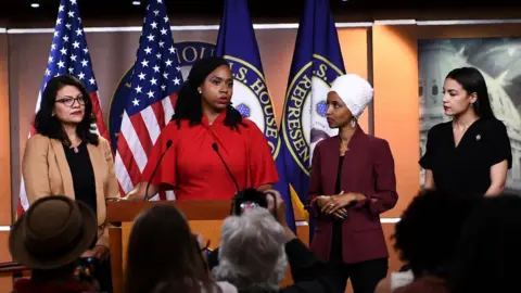 AFP L-R Representatives Rashida Tlaib, Ayanna Pressley, Ilhan Omar, and Alexandria Ocasio-Cortez