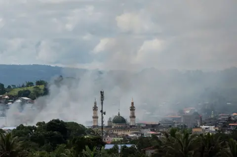 Getty Images Grand mosque in Marawi, under fire in June 2017