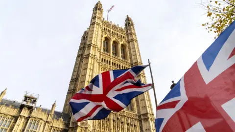 Getty Images British flags fly outside the Houses of Parliament in London, 30 October 2019