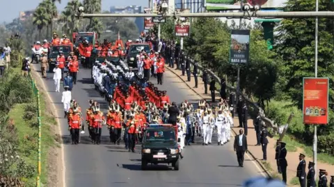 EPA Kenyan military officers lead a procession to carry the casket of late Daniel arap Moi, Kenya's second president, to Nyayo stadium