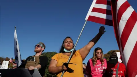 Reuters Supporters of U.S. President Donald Trump rally outside the State Capitol building in Harrisburg, Pennsylvania
