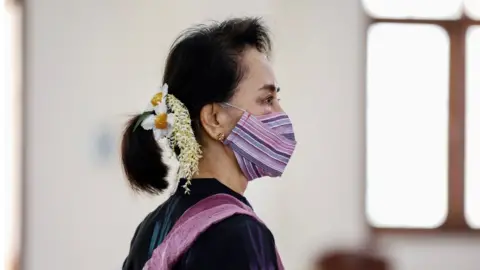 Reuters Aung San Suu Kyi at a coronavirus vaccination clinic in January, Naypyitaw, Myanmar