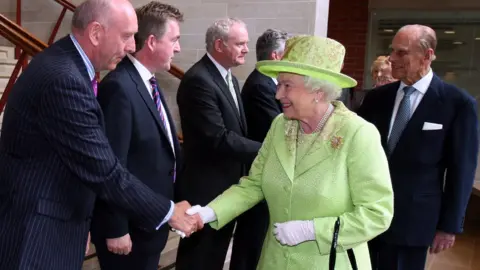 Getty Images The Queen shakes hands with Peter Sheridan from Co-operation Ireland as Prince Philip meets Northern Ireland Deputy First Minister Martin McGuinness at the Lyric Theatre in Belfast in 2012