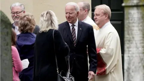 Reuters Joe Biden speaks with people outside St. Joseph on the Brandywine Catholic Church, in Wilmington, Delaware, U.S. May 30, 2021