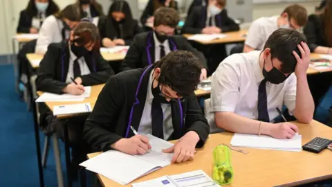 Getty Images Secondary school pupils in face masks in class