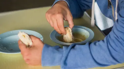 Getty Images Soup and bread