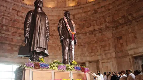 Getty Images Statues of Mayawati and BSP founder Kanshi Ram were built during her tenure