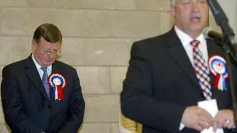 PA Media David Trimble lost his Westminster seat to David Simpson