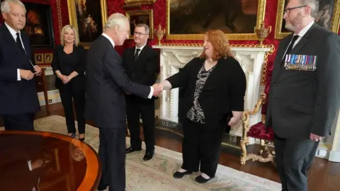 Reuters King Charles III meeting some of Northern Ireland's political leaders at Hillsborough Castle