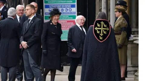 Peter Byrne/PA Wire Irish President Michael D Higgins and his wife, Sabina, arriving at Westminster Abbey