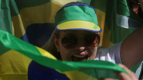 Reuters Fan of Bolsonaro at a rally