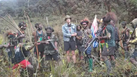 BBC Indonesia Philip Mehrtens with TPNPB fighters in the recent video footage